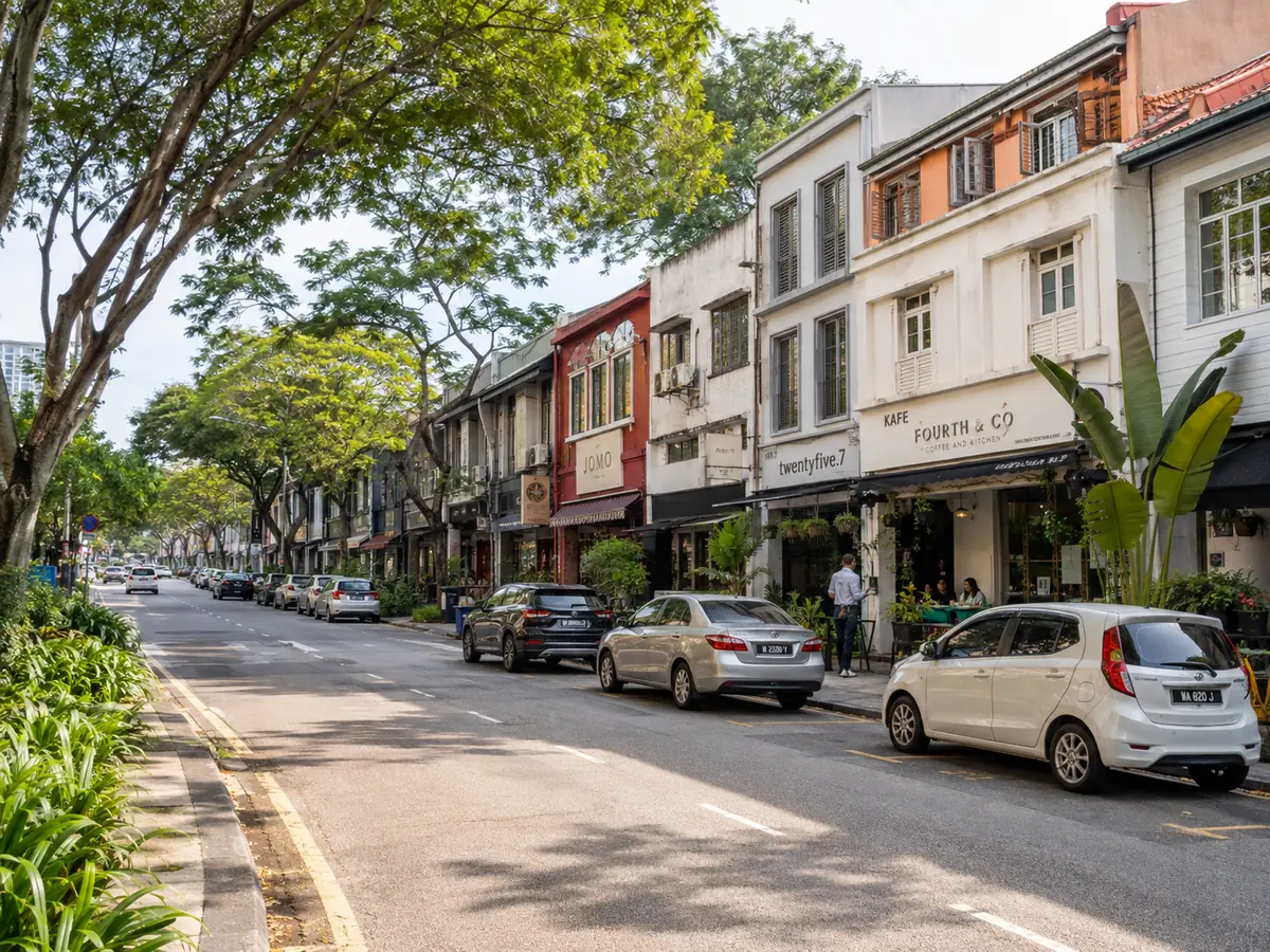 A leafy Bangsar shophouse street with cafes and daily life